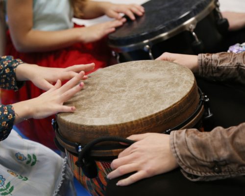 Kids,Play,Jembe,Drum,In,A,Montessori,Music,Therapy,Classroom